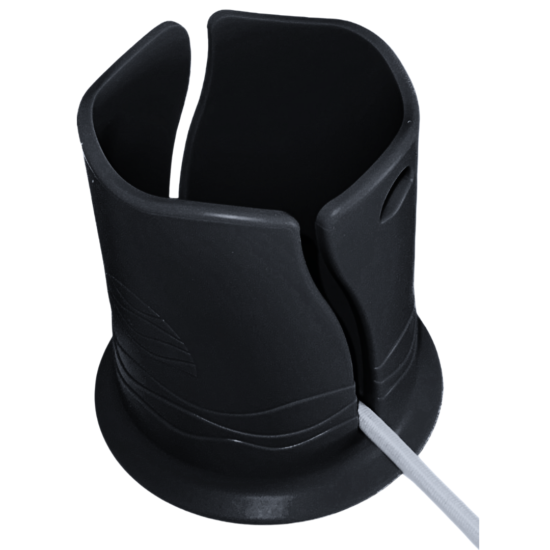 Black plastic cup holder in front of a white background. It has a groove in the side for attaching it to a paddleboard or boat, with a white bungee cord shown inside the groove.