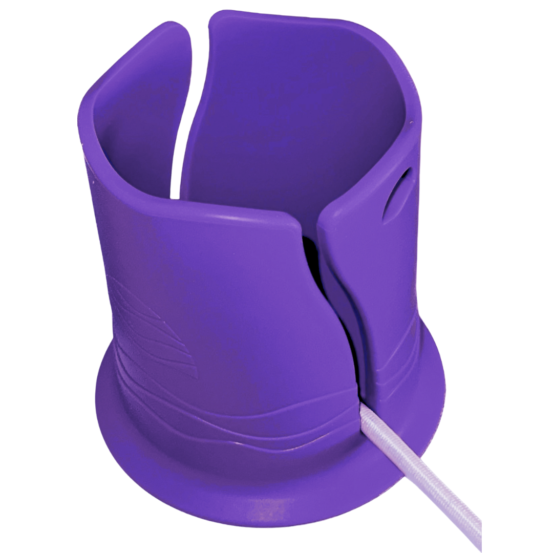 Bright purple plastic cup holder in front of a white background. It has a groove in the side for attaching it to a paddleboard or boat, with a white bungee cord shown inside the groove.