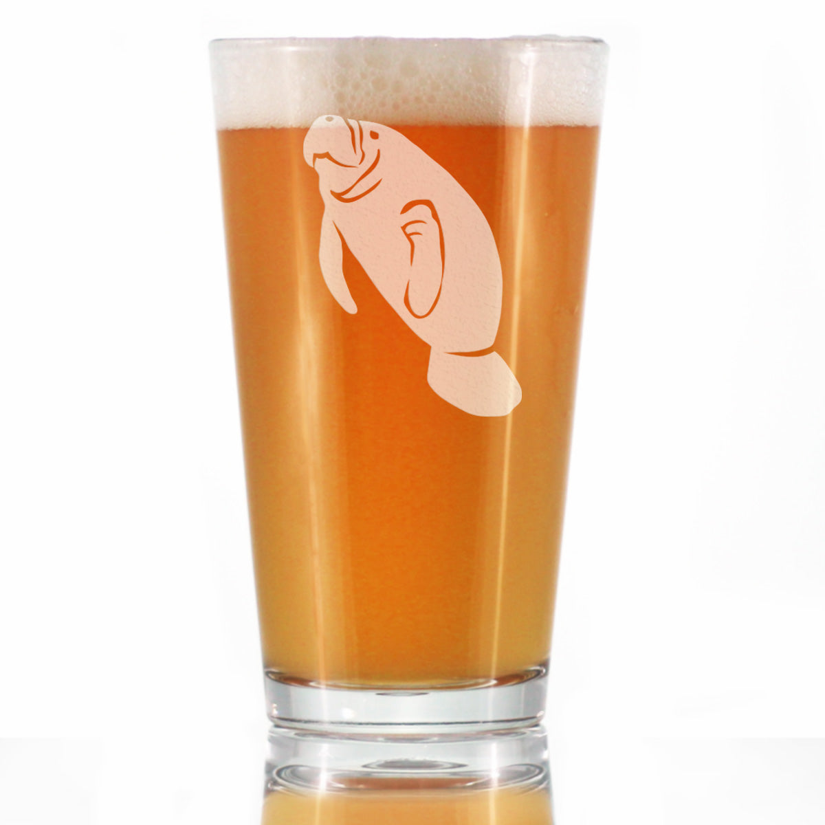 Clear glass with a manatee etching on it, filled with beer against a white background.
